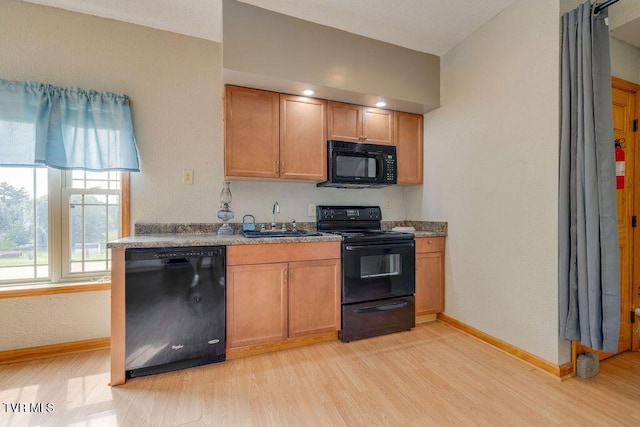 229 Ridgecrest Rd, Jonesborough, TN 37659 - kitchen featuring black appliances, a sink, light wood finished floors, and baseboards