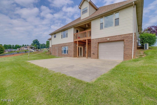 229 Ridgecrest Rd, Jonesborough, TN 37659 - rear view of house with brick siding, a yard, an attached garage, and a balcony