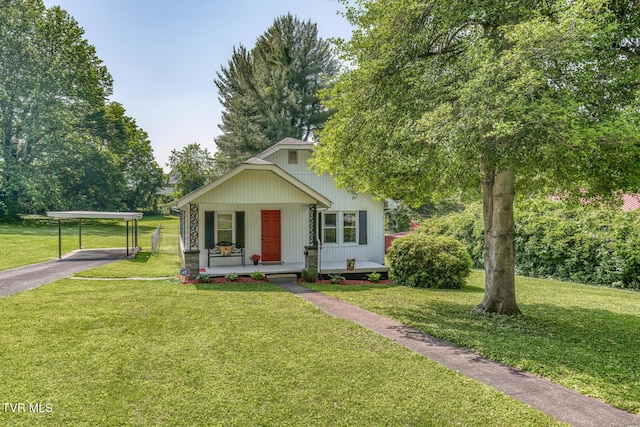 105 Crossway Rd, Bristol, VA 24201 - view of front of home featuring covered porch, a front yard, driveway, and a detached carport
