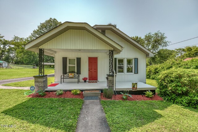 105 Crossway Rd, Bristol, VA 24201 - view of front of home with covered porch and a front yard