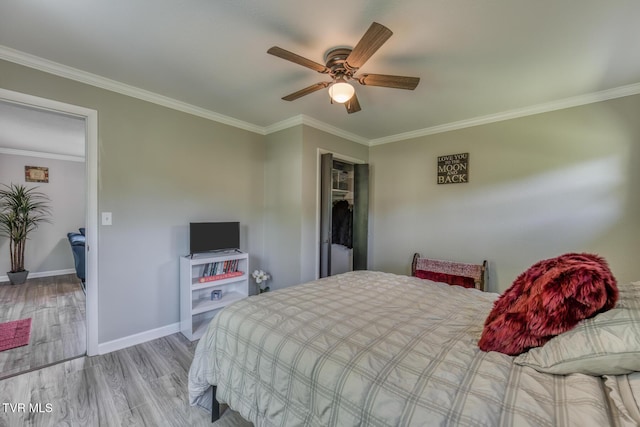 105 Crossway Rd, Bristol, VA 24201 - bedroom with baseboards, wood finished floors, crown molding, and a ceiling fan