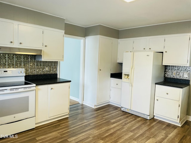 201 Brown St, Appalachia, VA 24216 - kitchen featuring white appliances, range hood, backsplash, dark wood-style floors, and dark countertops