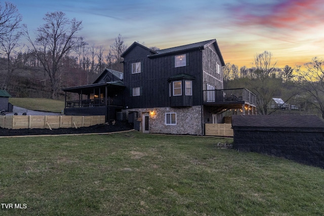 136 Beecher Holtsclaw Rd, Roan Mountain, TN 37687 - back of house featuring a wooden deck
