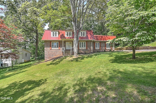 505 Red Oak Ln, Kingsport, TN 37663 - view of front of home featuring a front lawn, a metal roof, and brick siding
