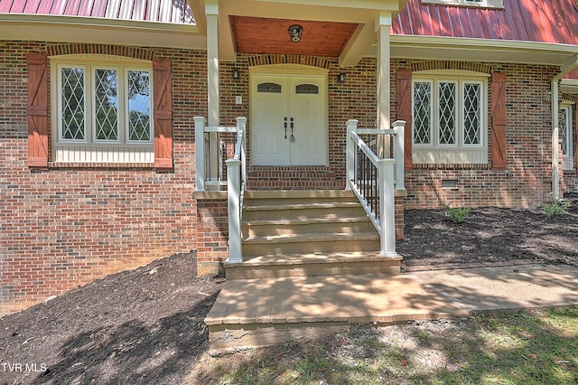 505 Red Oak Ln, Kingsport, TN 37663 - view of exterior entry featuring a metal roof and brick siding