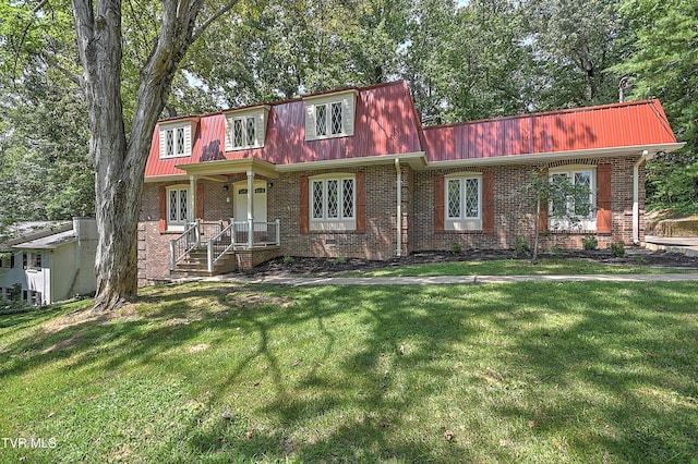 505 Red Oak Ln, Kingsport, TN 37663 - view of front facade featuring mansard roof, brick siding, a metal roof, and a front lawn