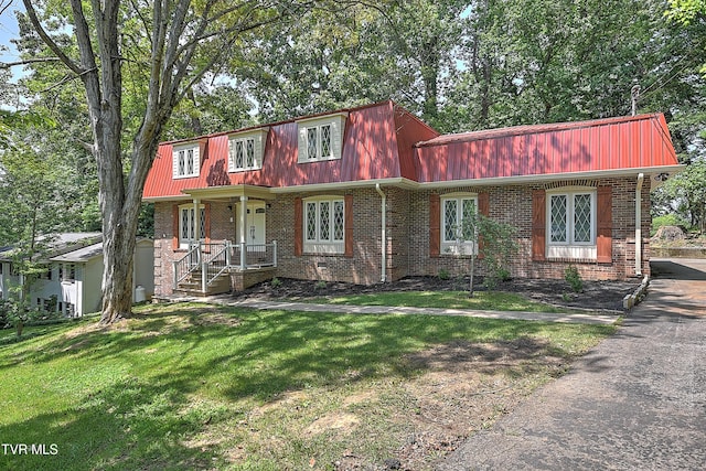 505 Red Oak Ln, Kingsport, TN 37663 - view of front of property featuring mansard roof, a metal roof, a front yard, and brick siding