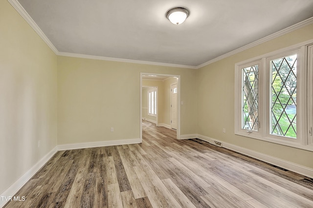 505 Red Oak Ln, Kingsport, TN 37663 - spare room with plenty of natural light, ornamental molding, and wood finished floors