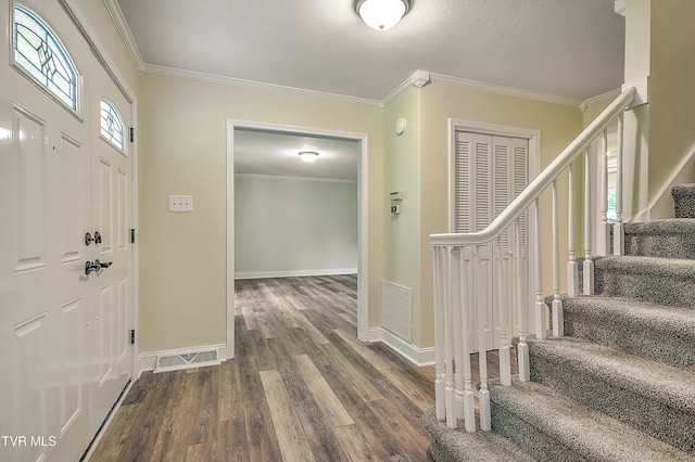 505 Red Oak Ln, Kingsport, TN 37663 - entrance foyer with stairs, wood finished floors, and ornamental molding