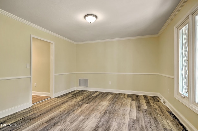 505 Red Oak Ln, Kingsport, TN 37663 - spare room with wood finished floors, plenty of natural light, and ornamental molding