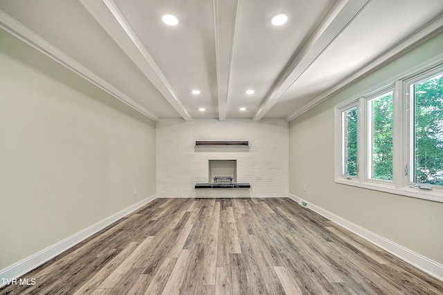 505 Red Oak Ln, Kingsport, TN 37663 - unfurnished living room featuring wood finished floors, beamed ceiling, a large fireplace, and recessed lighting