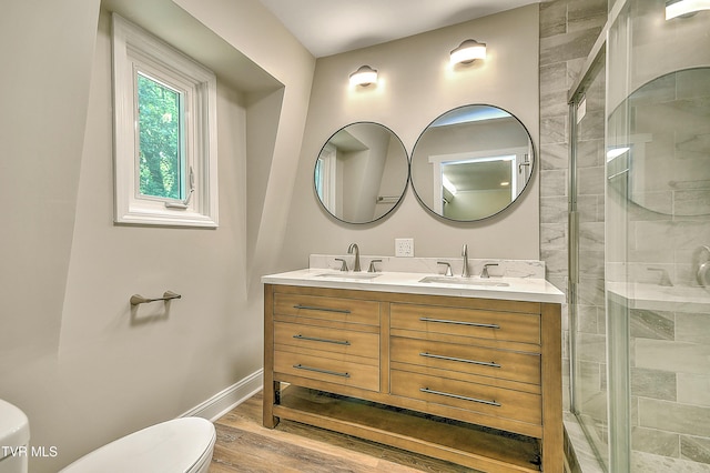 505 Red Oak Ln, Kingsport, TN 37663 - full bathroom featuring a stall shower, double vanity, and wood finished floors