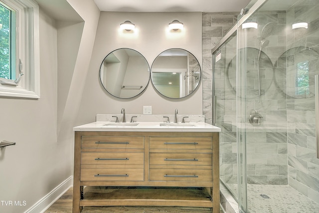 505 Red Oak Ln, Kingsport, TN 37663 - bathroom with double vanity, a shower stall, plenty of natural light, and wood finished floors
