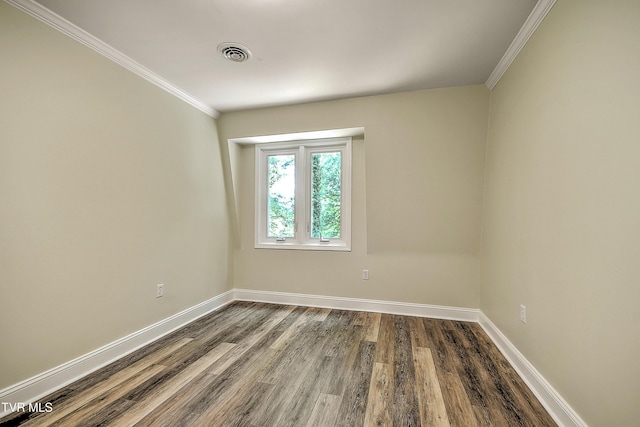 505 Red Oak Ln, Kingsport, TN 37663 - spare room featuring dark wood-style flooring and crown molding