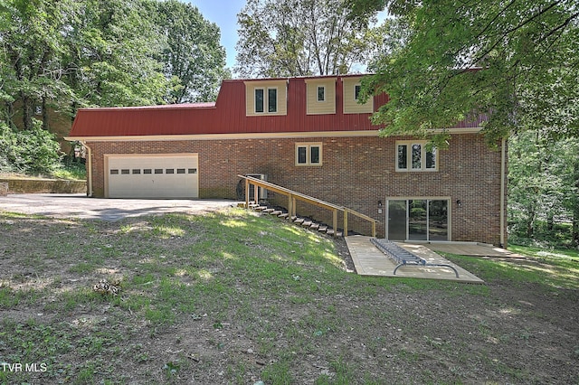 505 Red Oak Ln, Kingsport, TN 37663 - view of front of property with brick siding, a garage, concrete driveway, and stairway