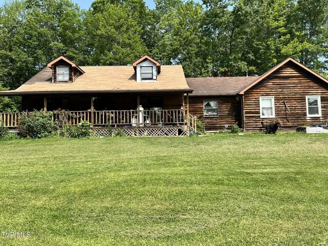 12615 Star Branch Rd, Coeburn, VA 24230 - view of front of house featuring a porch and a front lawn