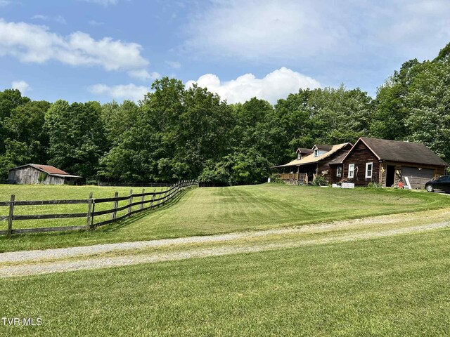 12615 Star Branch Rd, Coeburn, VA 24230 - view of yard featuring a garage and a forest view