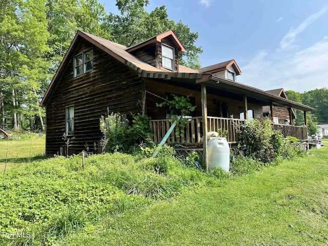 12615 Star Branch Rd, Coeburn, VA 24230 - view of home's exterior with a porch and a lawn