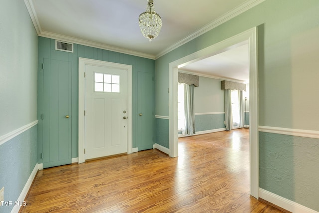 421 High Ridge Rd, Kingsport, TN 37660 - entrance foyer with crown molding, a chandelier, wood finished floors, and baseboards
