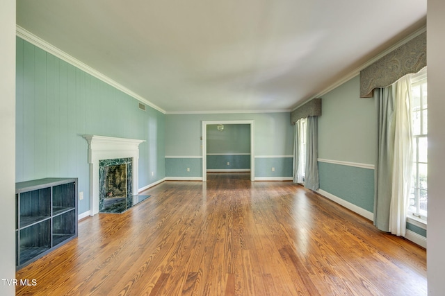 421 High Ridge Rd, Kingsport, TN 37660 - unfurnished living room with healthy amount of natural light, wood finished floors, a fireplace, and crown molding