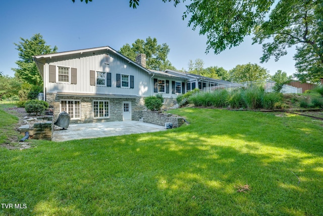 421 High Ridge Rd, Kingsport, TN 37660 - rear view of property with a patio, a chimney, stone siding, and a yard