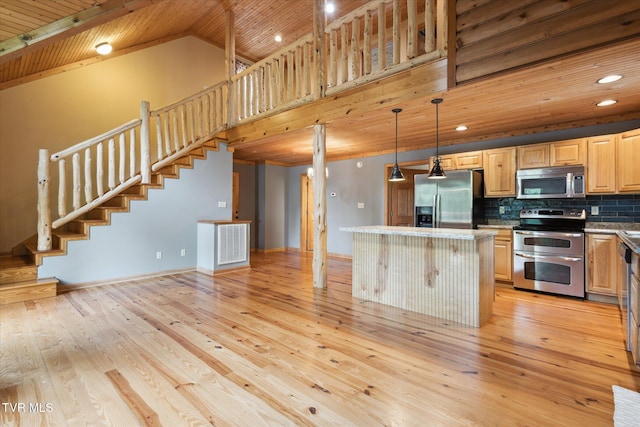 9245 Mendota Rd, Mendota, VA 24270 - kitchen with stainless steel appliances, wood ceiling, a center island, light wood-style flooring, and light brown cabinets