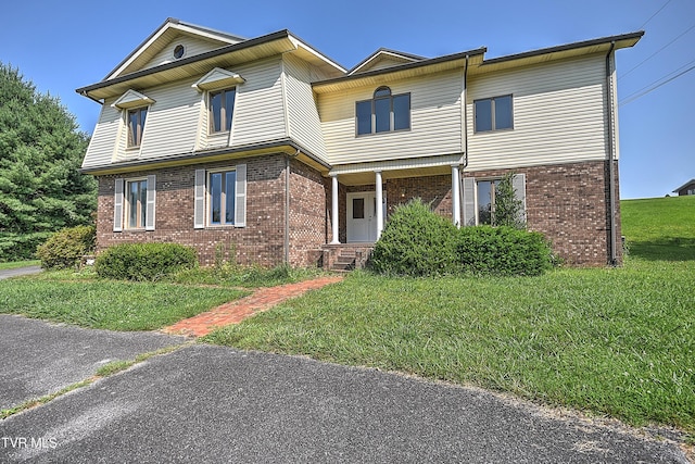 14191 King Mill Pike, Bristol, VA 24202 - view of front facade featuring brick siding and a front yard