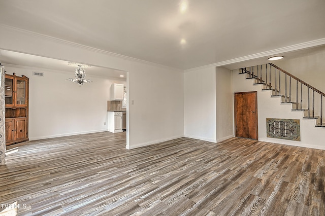 14191 King Mill Pike, Bristol, VA 24202 - unfurnished living room featuring wood finished floors, ornamental molding, stairway, a chandelier, and baseboards