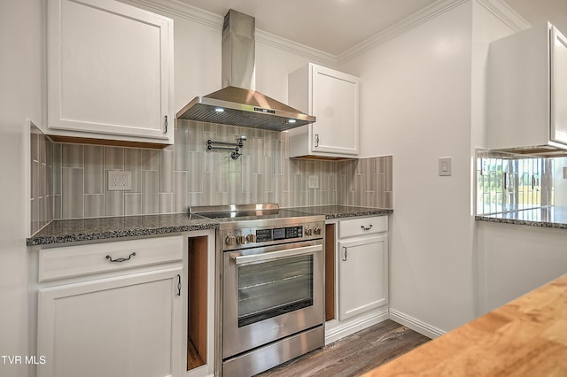 14191 King Mill Pike, Bristol, VA 24202 - kitchen featuring electric stove, wall chimney range hood, white cabinets, dark wood-type flooring, and crown molding