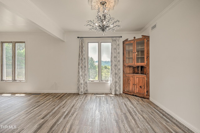 14191 King Mill Pike, Bristol, VA 24202 - empty room featuring light wood-style floors, plenty of natural light, a chandelier, baseboards, and ornamental molding