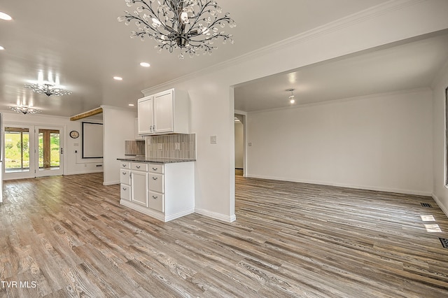 14191 King Mill Pike, Bristol, VA 24202 - kitchen with open floor plan, a chandelier, dark countertops, recessed lighting, and light wood-style floors