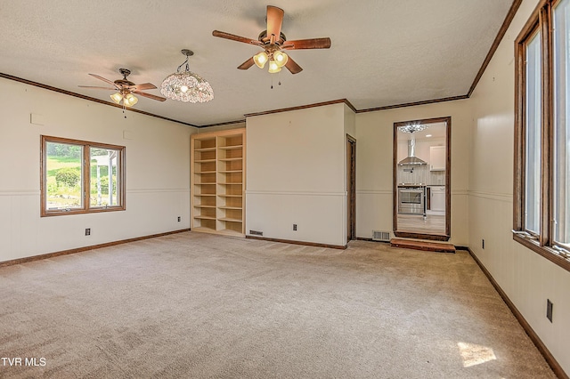 14191 King Mill Pike, Bristol, VA 24202 - unfurnished room with a ceiling fan, a textured ceiling, crown molding, light colored carpet, and baseboards