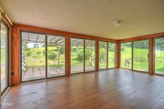 14191 King Mill Pike, Bristol, VA 24202 - unfurnished sunroom featuring plenty of natural light, wood finished floors, and wood ceiling