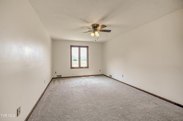 14191 King Mill Pike, Bristol, VA 24202 - spare room featuring ceiling fan, carpet flooring, and baseboards
