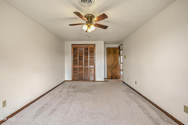 14191 King Mill Pike, Bristol, VA 24202 - spare room featuring a ceiling fan, carpet, and baseboards