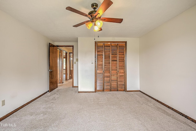 14191 King Mill Pike, Bristol, VA 24202 - unfurnished bedroom featuring light colored carpet, a closet, baseboards, and a ceiling fan
