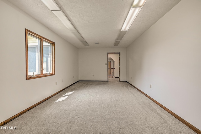 14191 King Mill Pike, Bristol, VA 24202 - empty room with light colored carpet, baseboards, and a textured ceiling