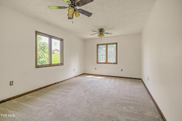 14191 King Mill Pike, Bristol, VA 24202 - unfurnished room with carpet flooring, a textured ceiling, ceiling fan, and baseboards