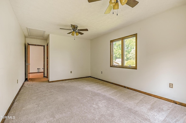 14191 King Mill Pike, Bristol, VA 24202 - empty room featuring attic access, ceiling fan, light colored carpet, and a textured ceiling