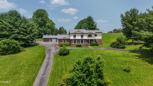 14191 King Mill Pike, Bristol, VA 24202 - traditional-style home with driveway, a garage, a front lawn, and brick siding