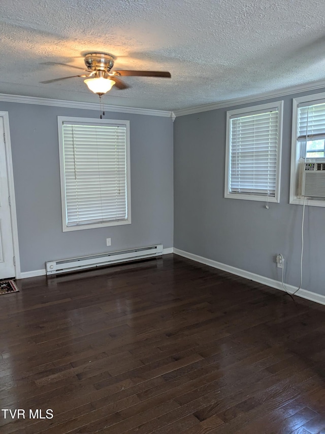 1319 5th St, Bristol, TN 37620 - spare room with a baseboard heating unit, dark wood-type flooring, a ceiling fan, crown molding, and a textured ceiling