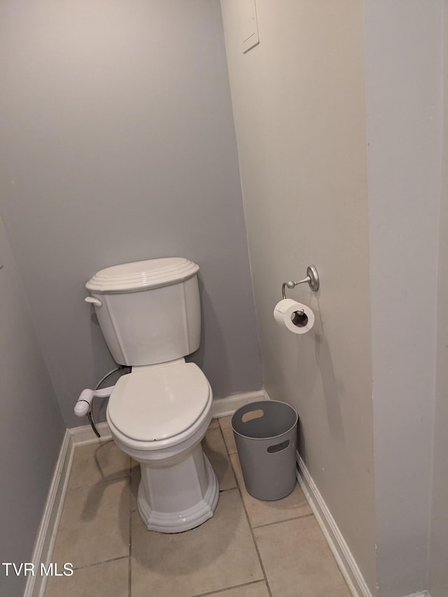 1319 5th St, Bristol, TN 37620 - bathroom with toilet, tile patterned floors, and baseboards