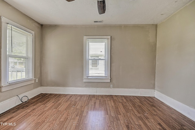 1725 Highland St, Kingsport, TN 37664 - unfurnished room featuring wood finished floors, ceiling fan, and baseboards