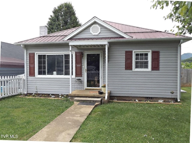 127 Banner St, Erwin, TN 37650 - bungalow with a chimney and metal roof