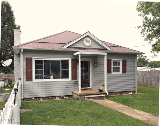 127 Banner St, Erwin, TN 37650 - bungalow-style house featuring a chimney and metal roof