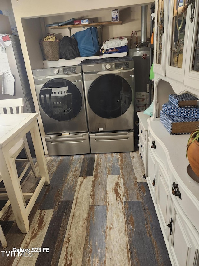 127 Banner St, Erwin, TN 37650 - washroom with washer and dryer, dark wood-style flooring, and water heater