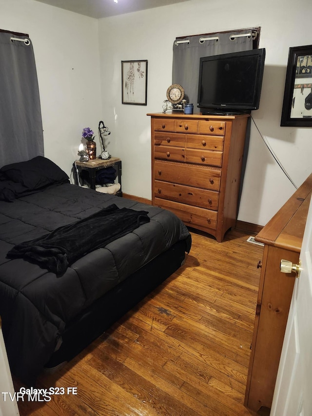 127 Banner St, Erwin, TN 37650 - bedroom with wood finished floors and baseboards