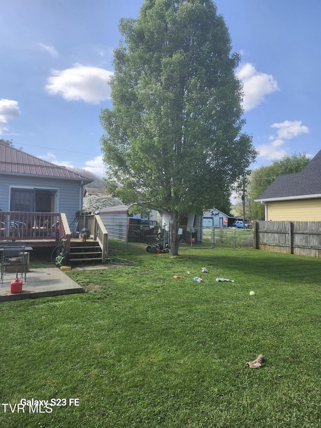 127 Banner St, Erwin, TN 37650 - view of yard featuring a deck and a patio area