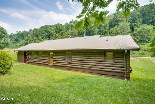 366 Judge Ben Allen Rd, Elizabethton, TN 37643 - view of property exterior with log siding, crawl space, a yard, and a forest view