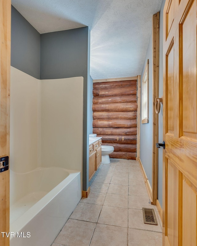 366 Judge Ben Allen Rd, Elizabethton, TN 37643 - full bathroom with log walls, baseboards, toilet, a textured ceiling, and vanity